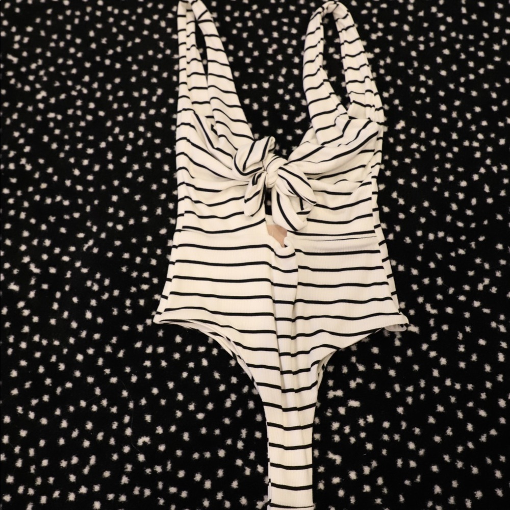 White and black striped body suit